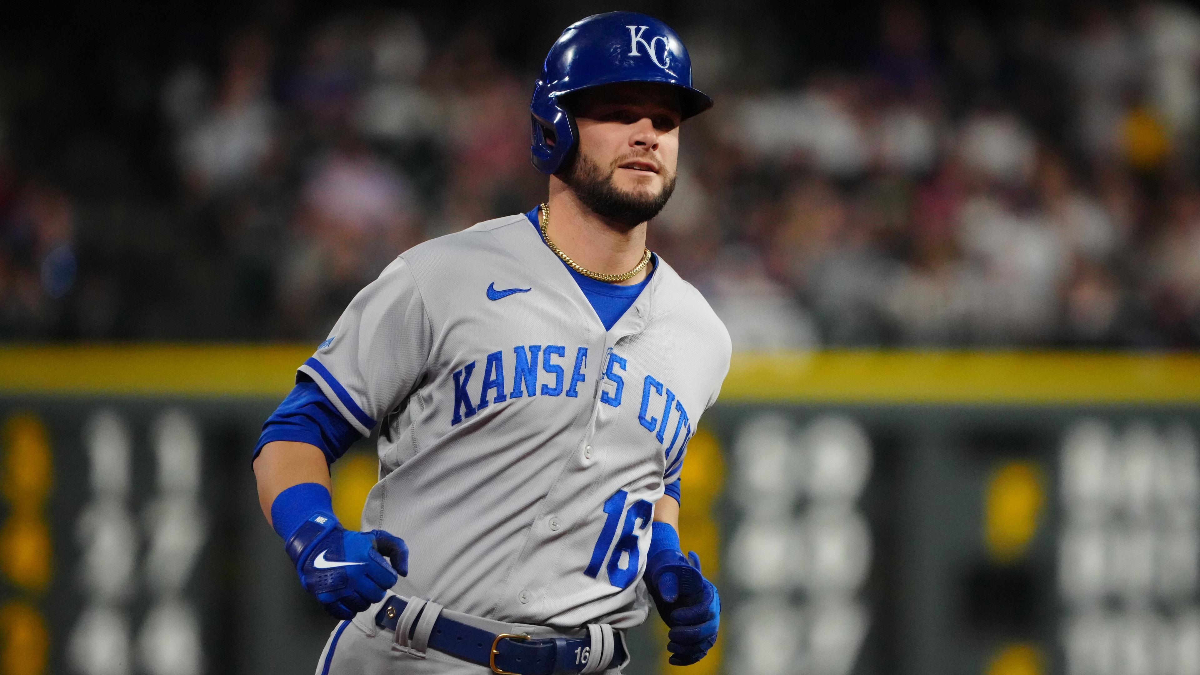 Kansas City Royals left fielder Andrew Benintendi (16) RBI triples in the seventh inning against the Colorado Rockies at Coors Field. / Ron Chenoy-USA TODAY Sports