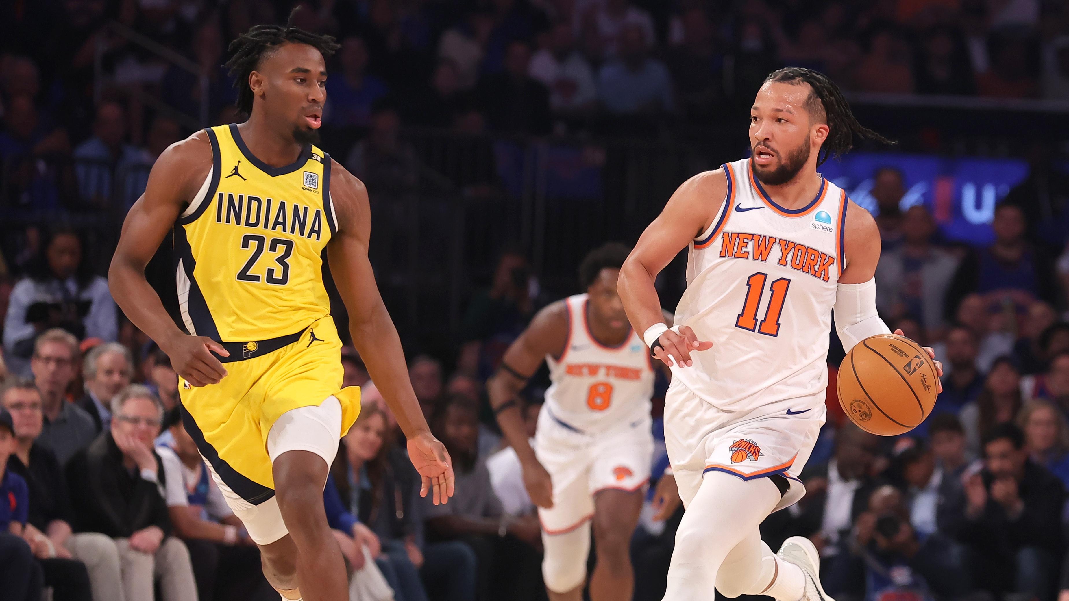 New York Knicks guard Jalen Brunson (11) brings the ball up court against Indiana Pacers forward Aaron Nesmith (23) during the first quarter of game one of the second round of the 2024 NBA playoffs at Madison Square Garden / Brad Penner - USA TODAY Sports