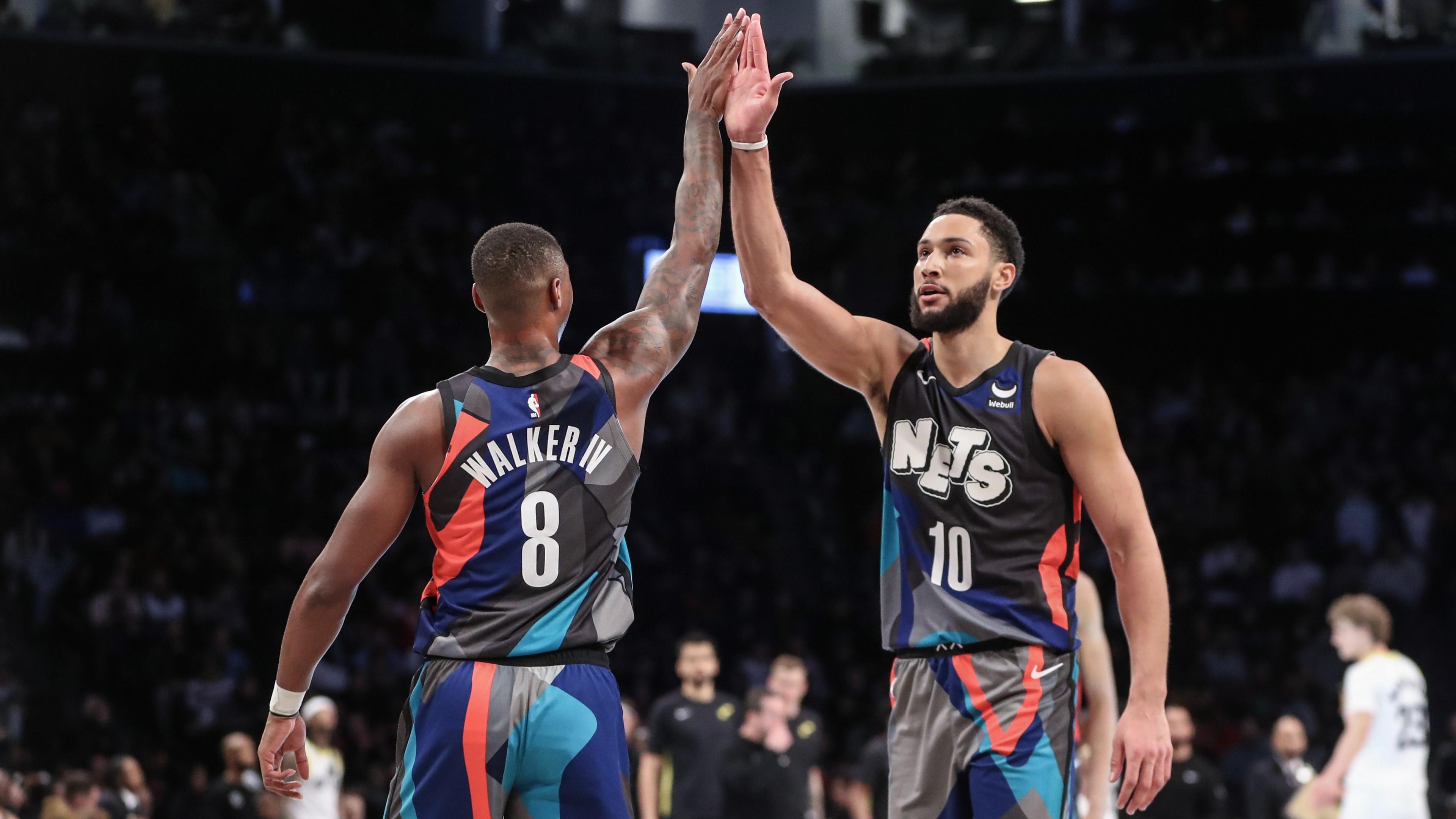 Jan 29, 2024; Brooklyn, New York, USA; Brooklyn Nets guard Lonnie Walker IV (8) greets guard Ben Simmons (10) during a timeout in the third quarter against the Utah Jazz at Barclays Center. Mandatory Credit: Wendell Cruz-USA TODAY Sports / © Wendell Cruz-USA TODAY Sports
