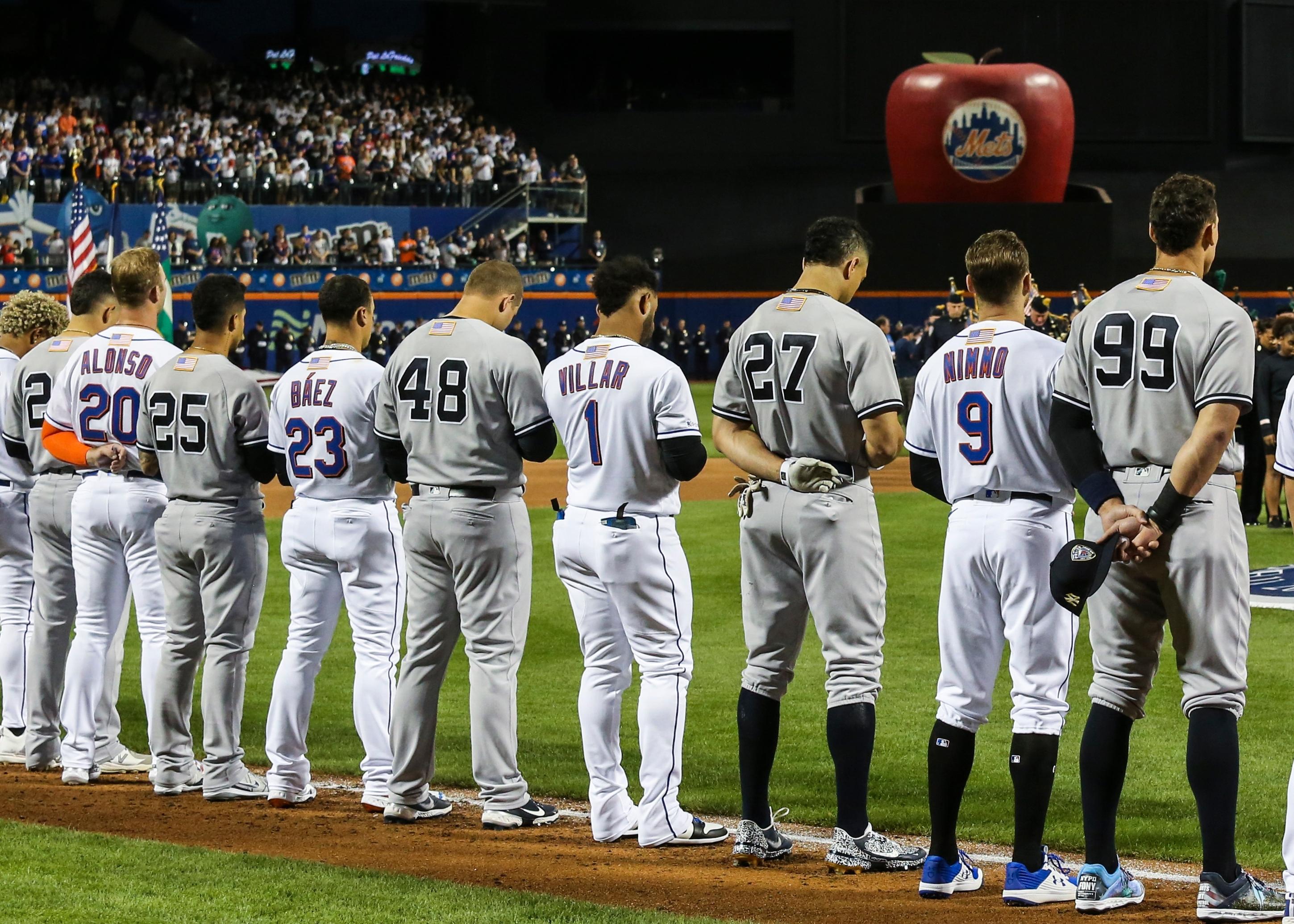 Sep 11, 2021; New York City, New York, USA; Members of the New York Yankees and New York Mets line up next to each other during the September 11 pre-game ceremonies at Citi Field. Mandatory Credit: Wendell Cruz-USA TODAY Sports / © Wendell Cruz-USA TODAY Sports