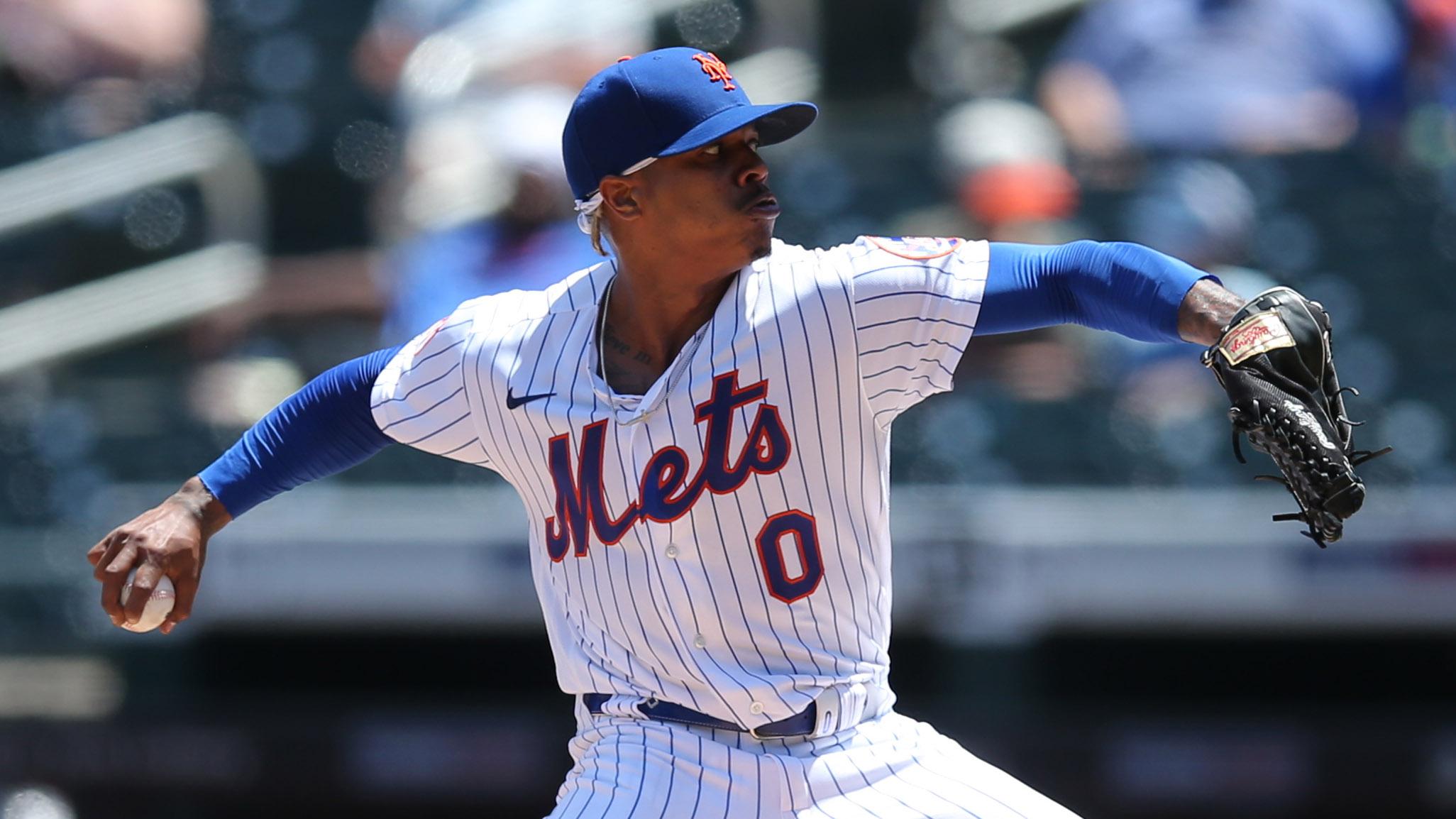 May 27, 2021; New York City, New York, USA; New York Mets starting pitcher Marcus Stroman (0) pitches against the Colorado Rockies during the second inning at Citi Field. / Brad Penner-USA TODAY Sports