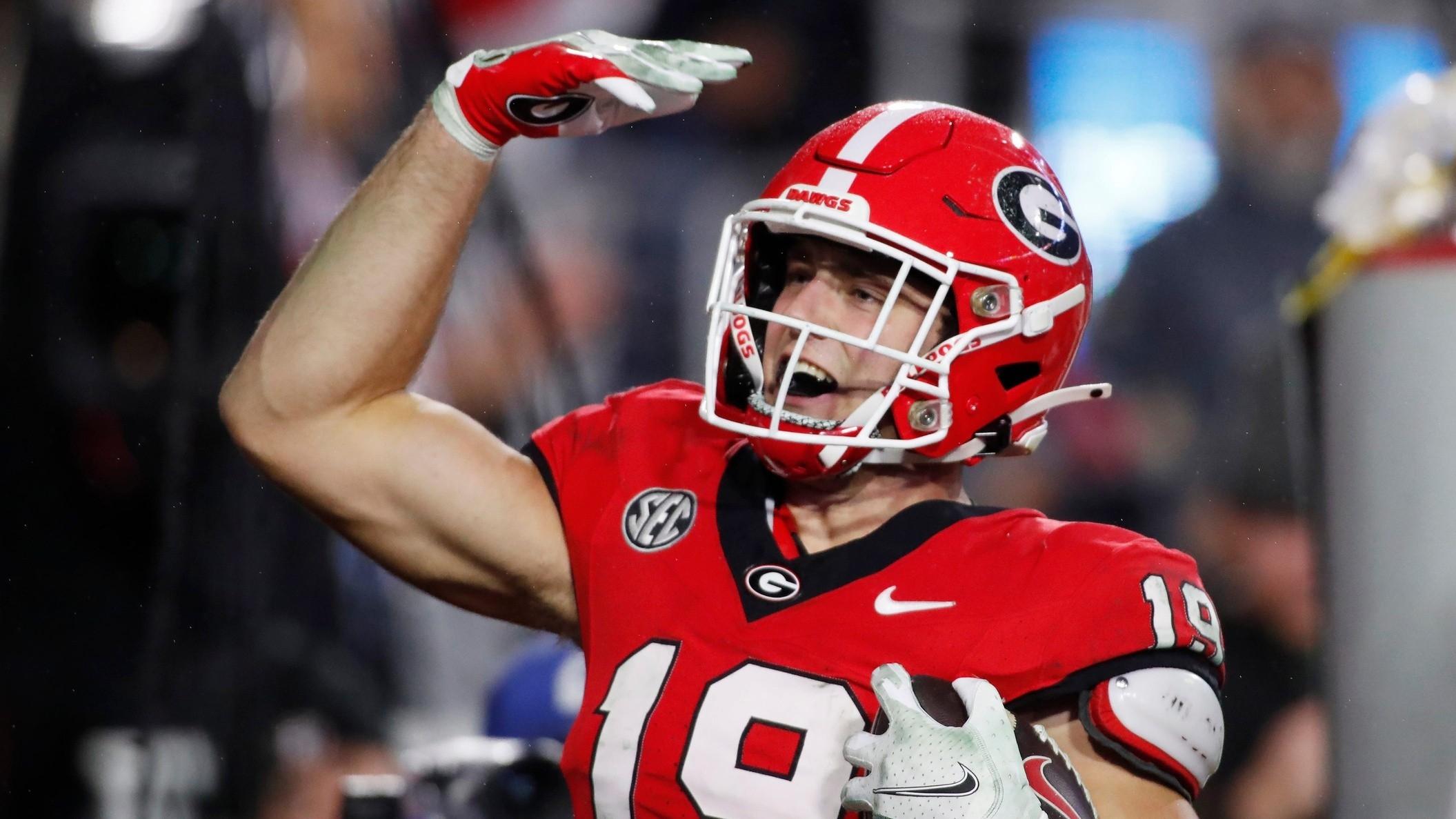 Georgia tight end Brock Bowers (19) celebrates after scoring a touchdown during the second half of a NCAA college football game against Ole Miss. / Joshua L. Jones / USA TODAY NETWORK