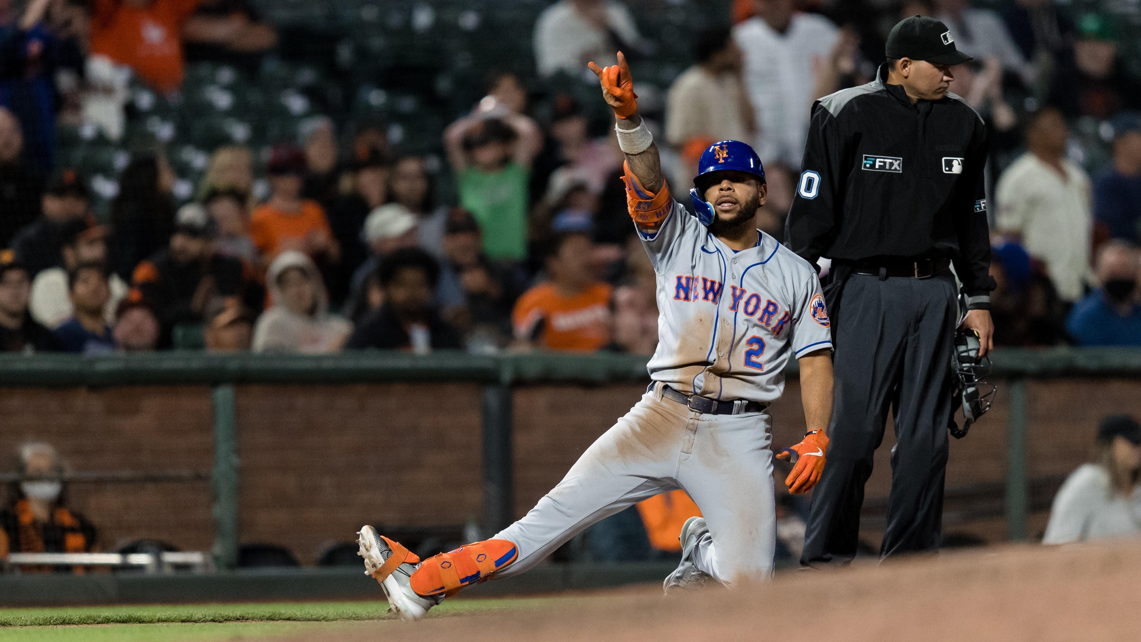 New York Mets first baseman Dominic Smith (2) reacts after hitting a staple against the San Francisco Giants during the ninth inning at Oracle Park. / John Hefti - USA TODAY Sports