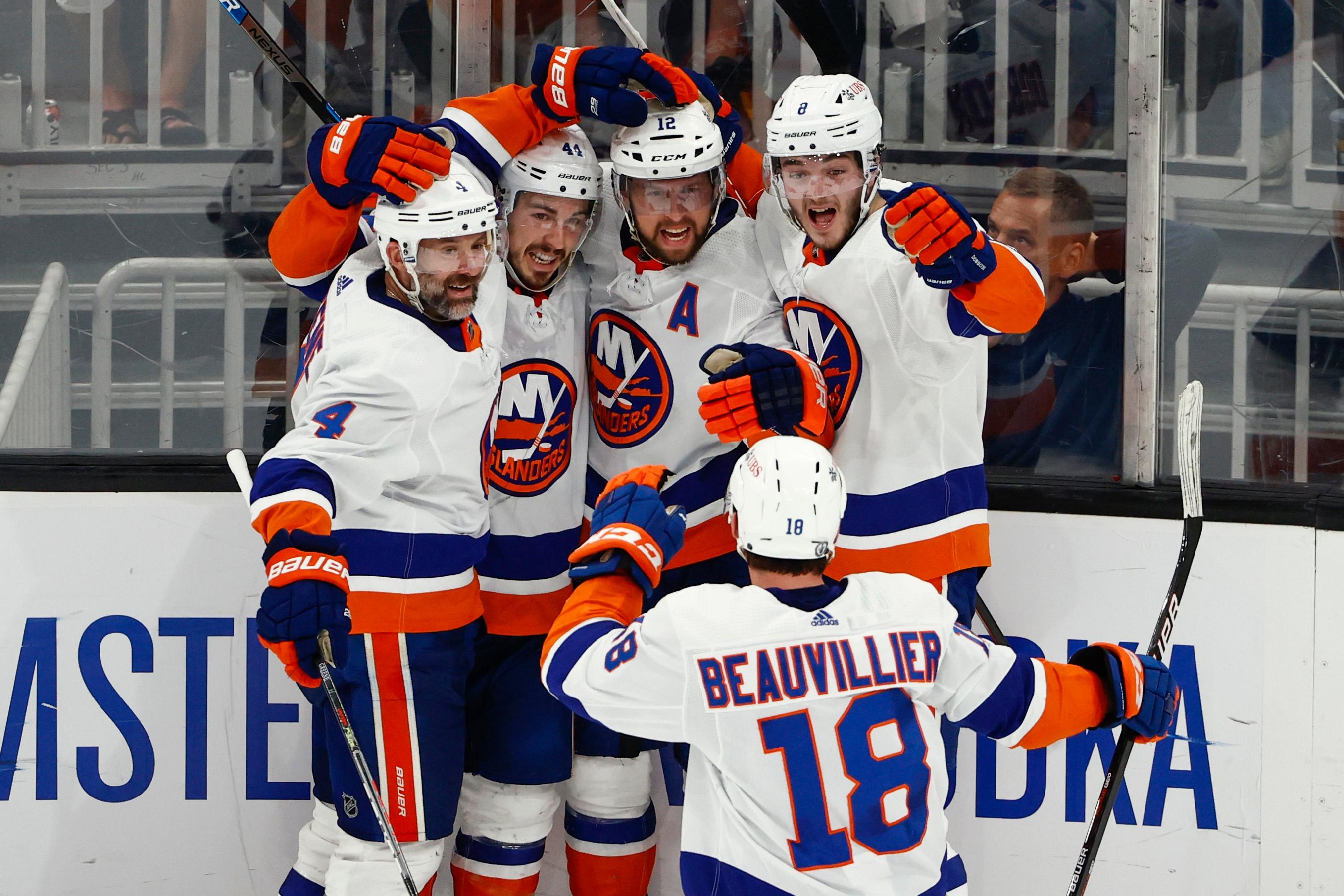 Jun 7, 2021; Boston, Massachusetts, USA; New York Islanders center Josh Bailey (12) celebrates his goal against the Boston Bruins with defenseman Robin Salo (4), center Jean-Gabriel Pageau (44), defenseman Noah Dobson (8) and left wing Anthony Beauvillier (18) during the second period of game five of the second round of the 2021 Stanley Cup Playoffs at TD Garden. Mandatory Credit: Winslow Townson-USA TODAY Sports / Winslow Townson-USA TODAY Sports
