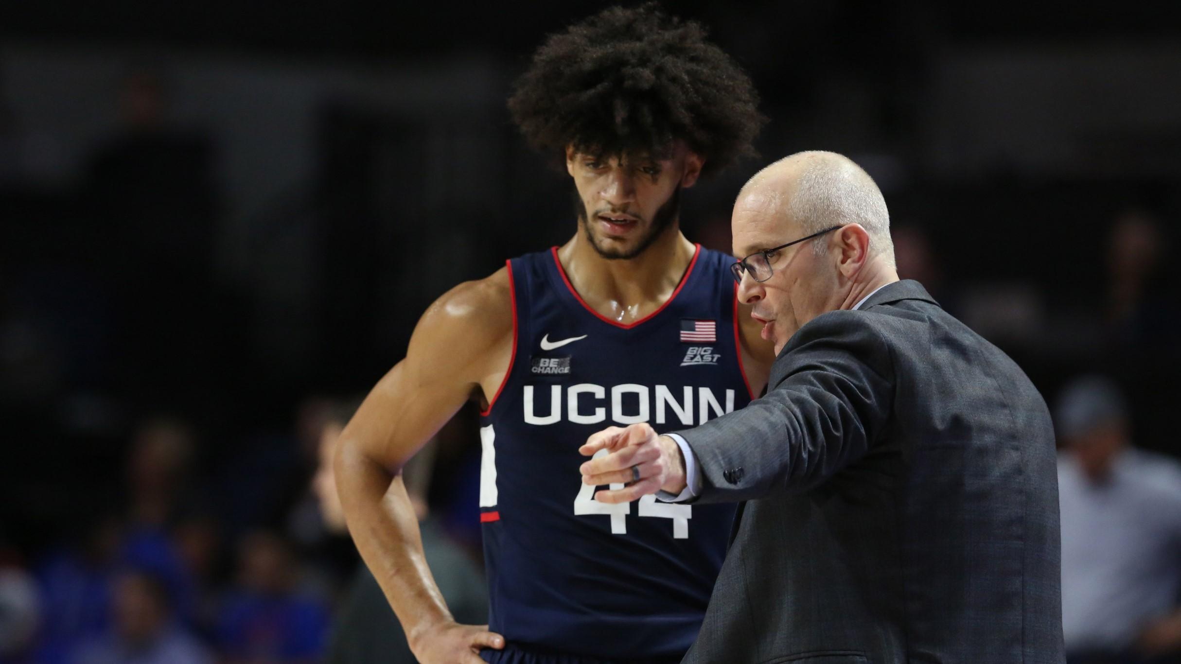 Dec 7, 2022; Gainesville, Florida, USA; Connecticut Huskies head coach Dan Hurley talks with guard Andre Jackson Jr. (44) during the second half at Exactech Arena at the Stephen C. O'Connell Center / Kim Klement-USA TODAY Sports