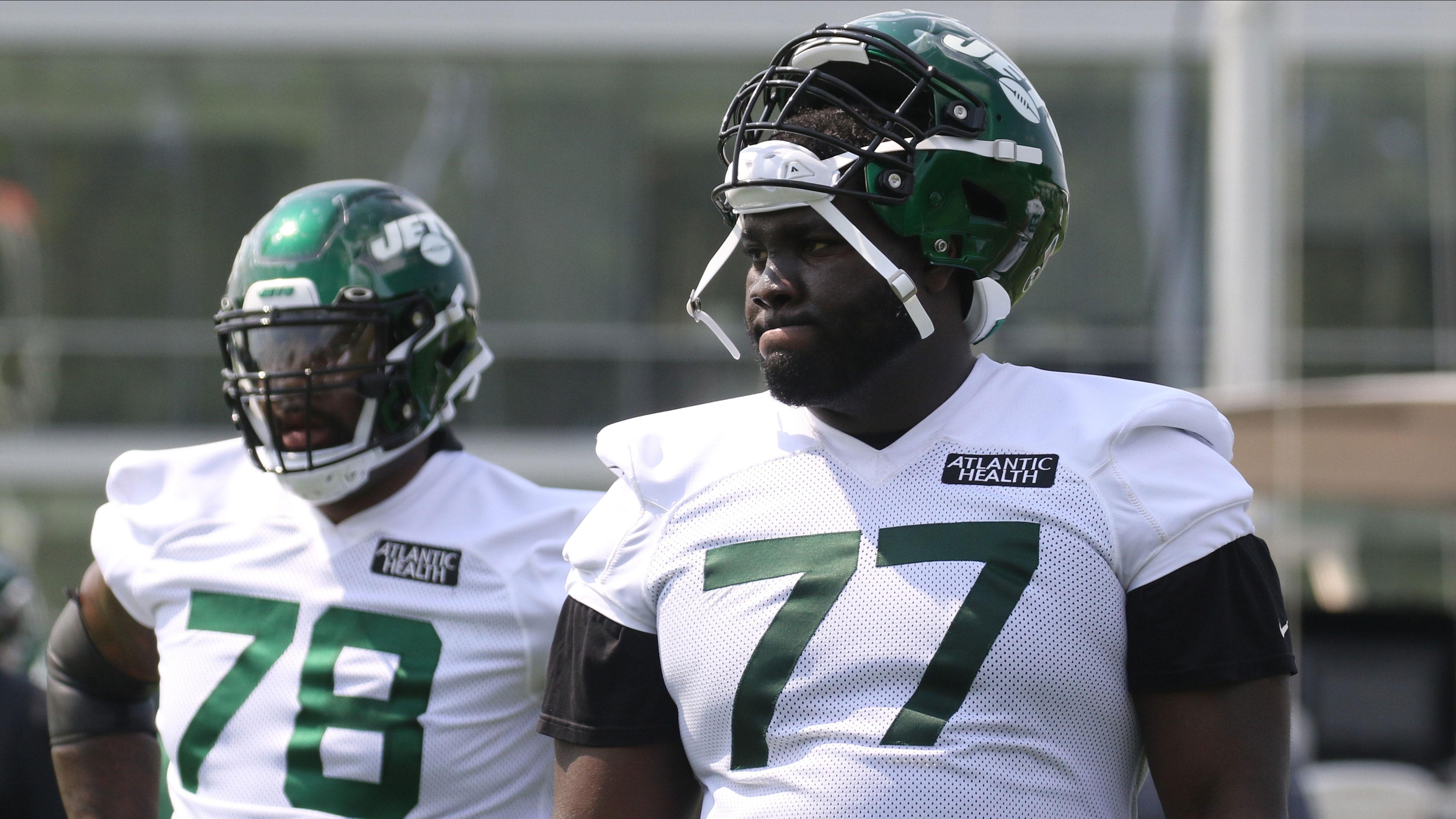 Jul 28, 2021; Florham Park, NJ, USA; Offensive linemen Morgan Moses and Mekhi Becton during drills as the New York Jets hold their first practice of training camp at their practice facility in Florham Park, NJ on July 28, 2021. / NorthJersey.com-USA TODAY NETWORK