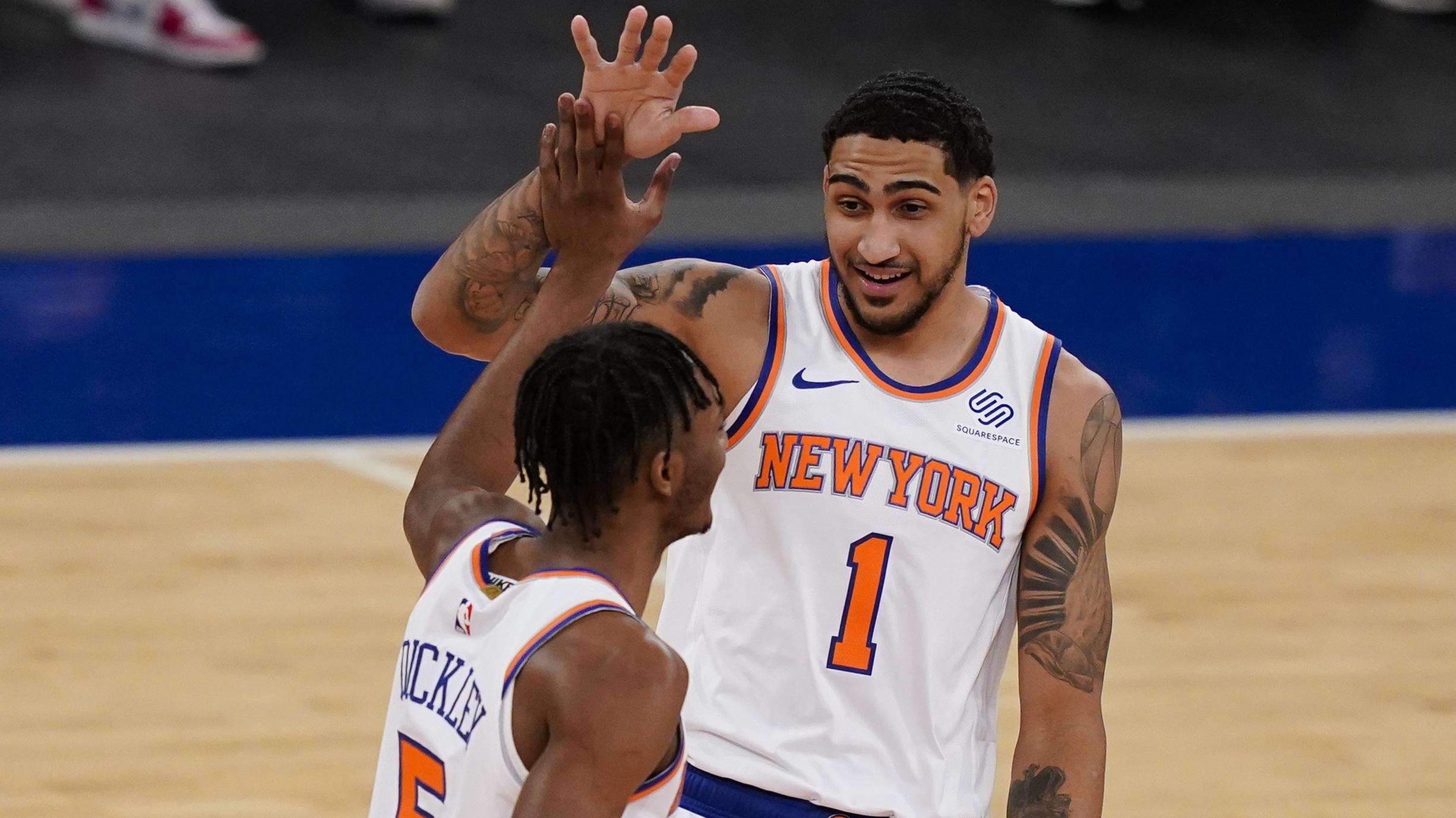 Feb 25, 2021; New York, New York, USA; New York Knicks guard Immanuel Quickley (5) celebrates with forward Obi Toppin (1) after scoring against the Sacramento Kings in the first half at Madison Square Garden. / © POOL PHOTOS-USA TODAY Sports