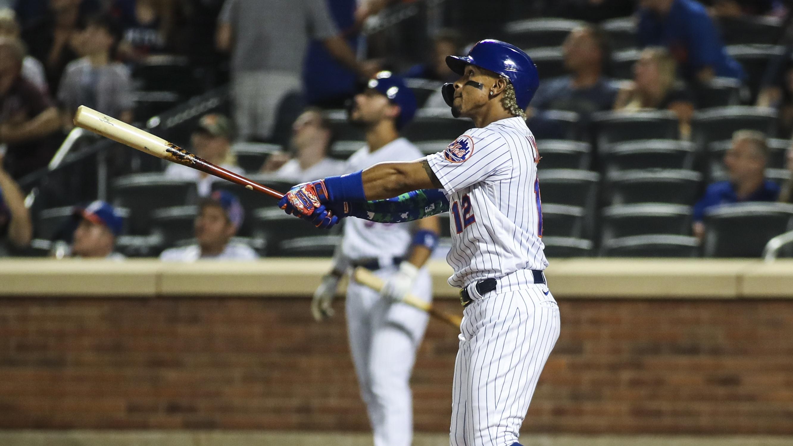 Sep 12, 2021; New York City, New York, USA; New York Mets shortstop Francisco Lindor (12) watches after hitting a three run home run in the second inning against the New York Yankees at Citi Field. / © Wendell Cruz-USA TODAY Sports