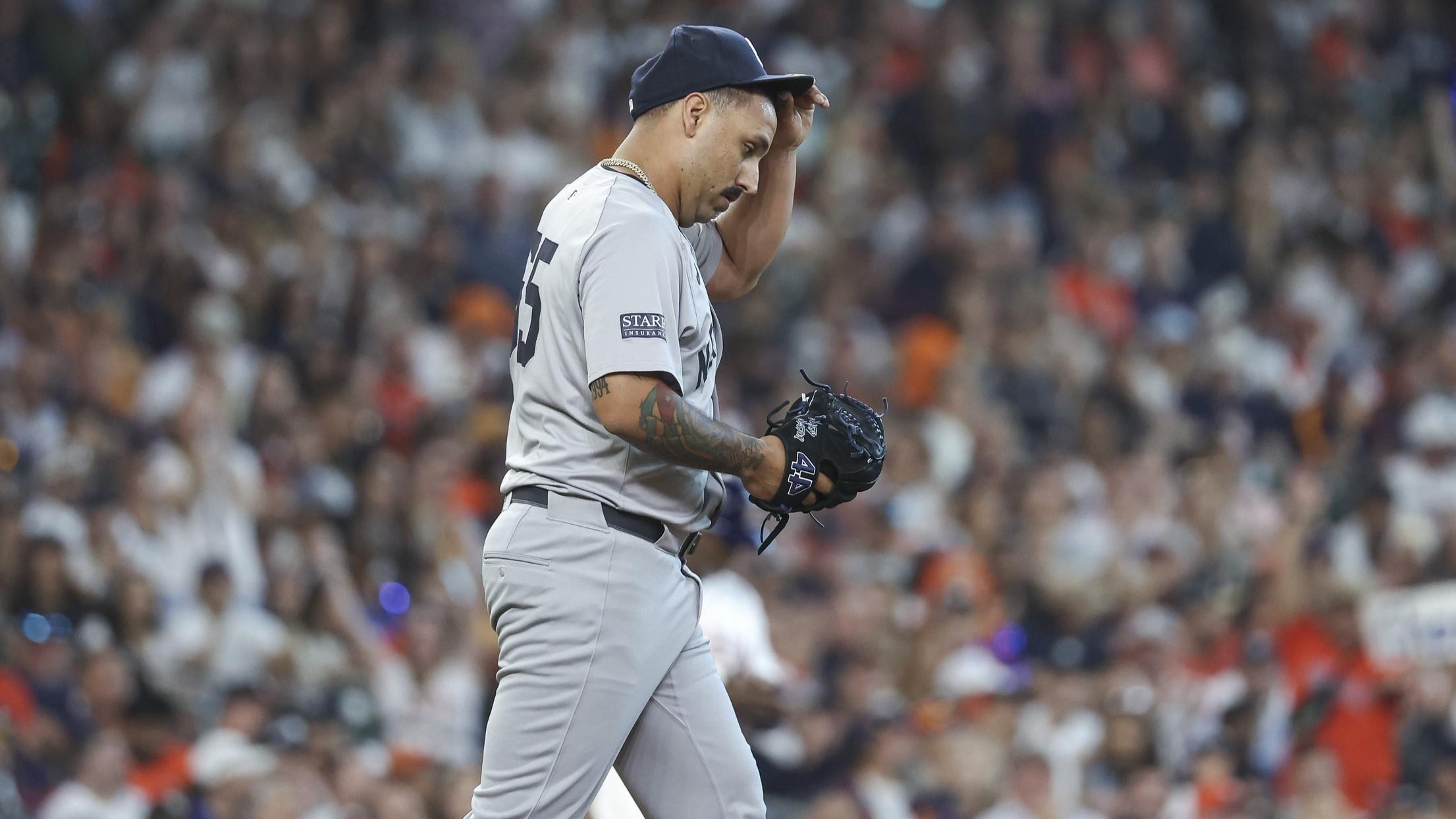 Mar 28, 2024; Houston, Texas, USA; New York Yankees starting pitcher Nestor Cortes (65) reacts after a pitch during the first inning against the Houston Astros at Minute Maid Park. / Troy Taormina-USA TODAY Sports