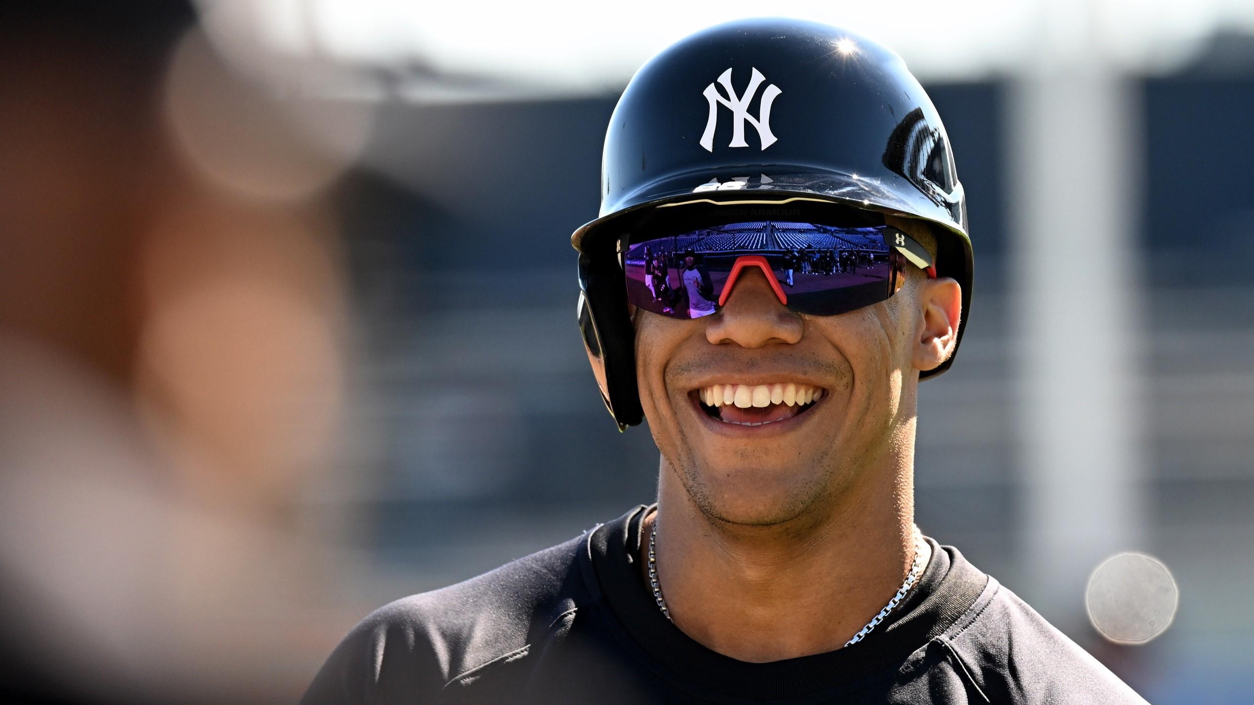 Feb 20, 2024; Tampa, FL, USA; New York Yankees outfielder Juan Soto (22) laughs after finishing a drill at George M. Steinbrenner Field. / Jonathan Dyer-USA TODAY Sports