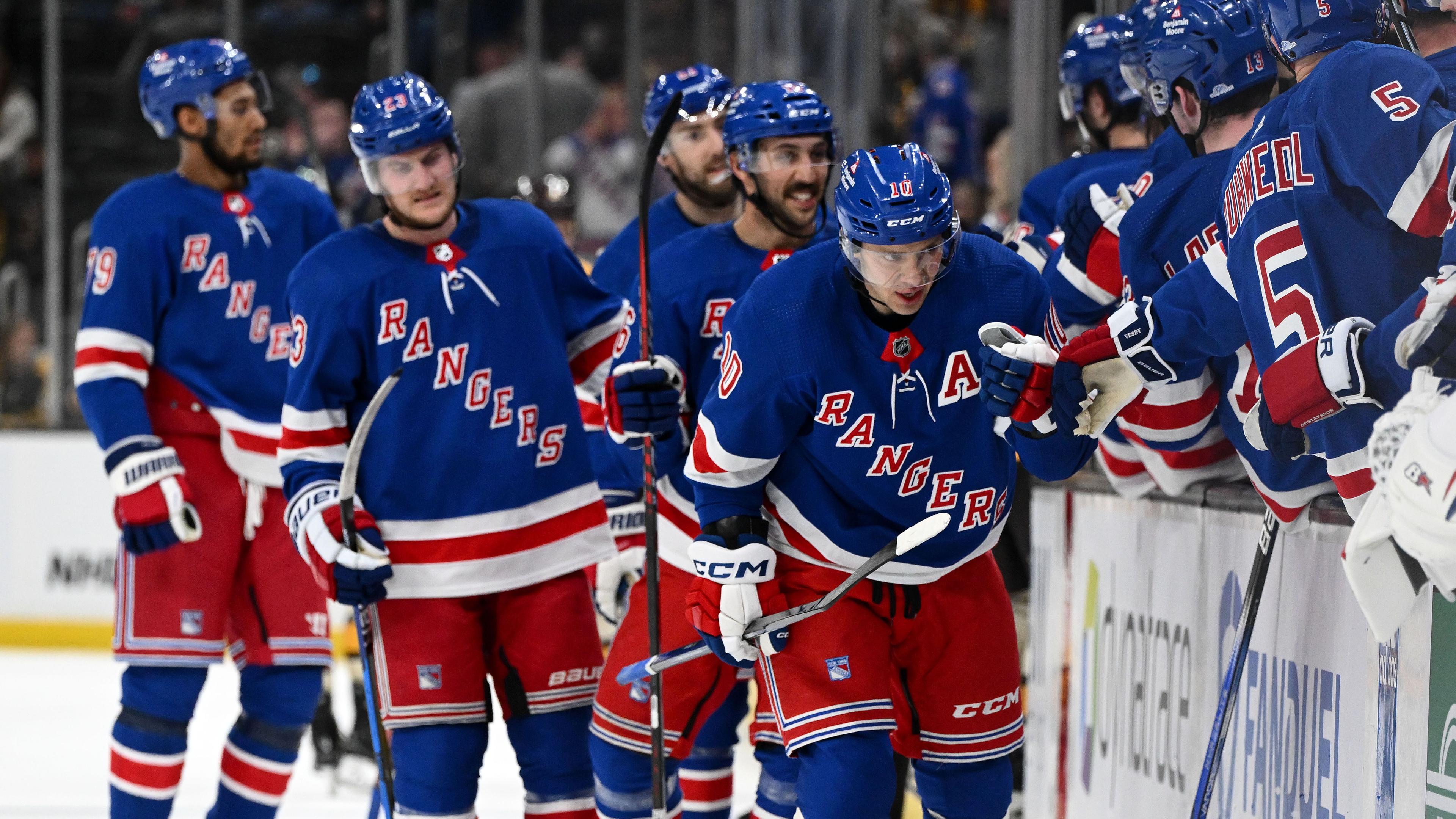 Mar 21, 2024; Boston, Massachusetts, USA; New York Rangers left wing Artemi Panarin (10) celebrates with his teammates after scoring a goal against the Boston Bruins during the third period at the TD Garden. / Brian Fluharty - USA TODAY Sports