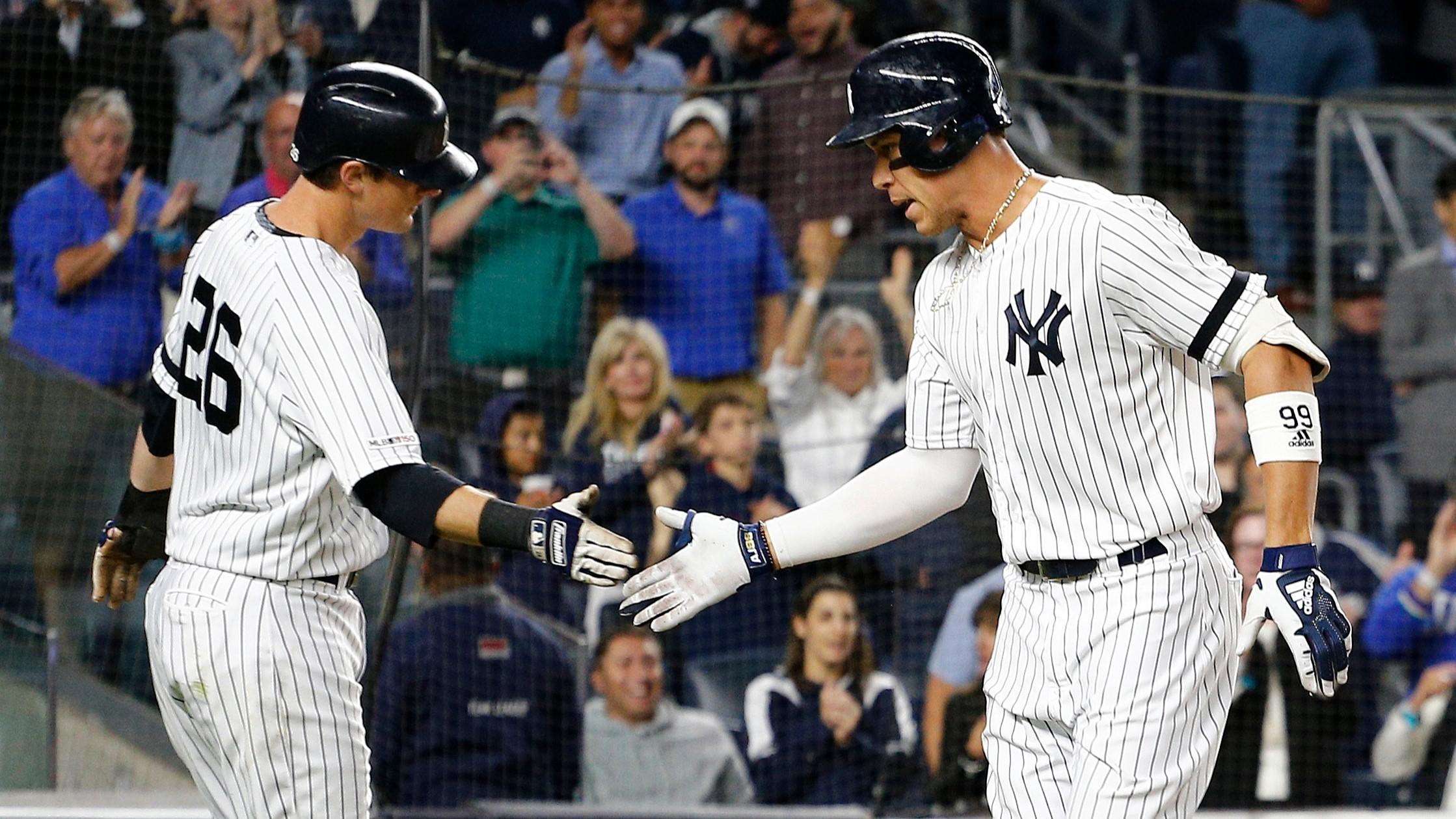 Sep 18, 2019; Bronx, NY, USA; New York Yankees right fielder Aaron Judge (99) is congratulated by second baseman DJ LeMahieu (26) after hitting a two run home run against the Los Angeles Angels during the third inning at Yankee Stadium. Mandatory Credit: Andy Marlin-USA TODAY Sports / Andy Marlin-USA TODAY Sports
